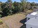 Large backyard with fenced perimeter and trees at 11253 Sw 77Th Ct, Ocala, FL 34476