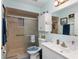 Bathroom with a walk in shower and white vanity at 11253 Sw 77Th Ct, Ocala, FL 34476