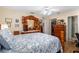 Main bedroom with a dresser and walk-in closet at 11253 Sw 77Th Ct, Ocala, FL 34476