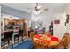 Cozy dining area with wood table and chairs, near kitchen at 11253 Sw 77Th Ct, Ocala, FL 34476