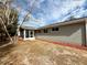 House exterior with screened porch and partially landscaped yard at 11440 Sw 85Th Ave, Ocala, FL 34481