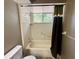 Bathroom with tub, shower and window at 11440 Sw 85Th Ave, Ocala, FL 34481