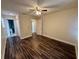 Spacious bedroom with hardwood floors and access to bathroom at 11440 Sw 85Th Ave, Ocala, FL 34481