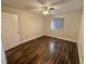 Bedroom with wood flooring and ceiling fan at 11440 Sw 85Th Ave, Ocala, FL 34481