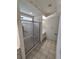 Bathroom with shower stall and tiled floor at 11577 Sw 72Nd Cir, Ocala, FL 34476