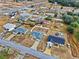 Aerial view of homes and properties in a residential neighborhood at 12 Pine Trace Pl, Ocala, FL 34472