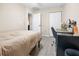 Comfortable bedroom with neutral tones, modern flooring and double door closet at 12 Pine Trace Pl, Ocala, FL 34472