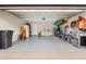 Spacious garage with ample storage space and room for vehicles and equipment at 12 Pine Trace Pl, Ocala, FL 34472