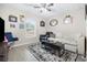Cozy living room with plush seating, area rug and plenty of natural light at 12 Pine Trace Pl, Ocala, FL 34472
