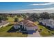 Single-story home with golf course views and a two-car garage at 12955 Se 93Rd Cir, Summerfield, FL 34491