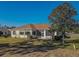 House with a screened-in patio and spacious backyard at 12955 Se 93Rd Cir, Summerfield, FL 34491