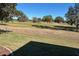 View of a lush green golf course from the backyard at 12955 Se 93Rd Cir, Summerfield, FL 34491