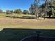 Peaceful backyard view overlooking a golf course at 12955 Se 93Rd Cir, Summerfield, FL 34491