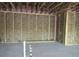 Spacious unfinished basement with exposed beams and pink insulation ready for customization at 13055 Ne 7Th Loop, Silver Springs, FL 34488