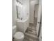 Modern bathroom with white vanity and grey flooring at 13055 Ne 7Th Loop, Silver Springs, FL 34488