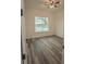 Bedroom with lake view and ceiling fan at 13055 Ne 7Th Loop, Silver Springs, FL 34488