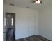 This room has luxury vinyl plank flooring and two closets at 13055 Ne 7Th Loop, Silver Springs, FL 34488