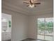 Bedroom with hardwood floors and lake view at 13055 Ne 7Th Loop, Silver Springs, FL 34488