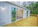 Spacious deck with sliding glass doors leading inside at 13055 Ne 7Th Loop, Silver Springs, FL 34488