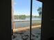 View from a deck with a picturesque lake view at 13055 Ne 7Th Loop, Silver Springs, FL 34488