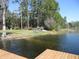 Lake with sandy access for canoes and kayaks at 13055 Ne 7Th Loop, Silver Springs, FL 34488