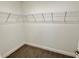 Walk-in closet with wire shelving at 13380 Se 43Rd Ave, Belleview, FL 34420