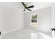 Spacious bedroom with large window and marble floors at 14363 Se 36Th Ct, Summerfield, FL 34491