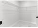 Walk-in closet with wire shelving at 14363 Se 36Th Ct, Summerfield, FL 34491