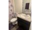 Clean bathroom with single sink vanity, toilet and shower at 15155 Sw 52 Cir, Ocala, FL 34473