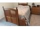 Bedroom with wooden bed frame and chest of drawers at 15155 Sw 52 Cir, Ocala, FL 34473