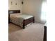 Cozy bedroom with double bed and carpeted floor at 15155 Sw 52 Cir, Ocala, FL 34473