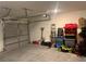 Garage with an automatic door opener and storage at 15155 Sw 52 Cir, Ocala, FL 34473