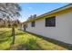 White barn exterior with black window accents at 15315 Nw 115Th Ct, Reddick, FL 32686