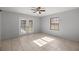 Bedroom with French doors opening to patio at 15315 Nw 115Th Ct, Reddick, FL 32686