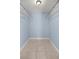 Large walk-in closet with double hanging rods at 15315 Nw 115Th Ct, Reddick, FL 32686