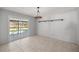 Dining area with sliding glass doors leading to pool at 15315 Nw 115Th Ct, Reddick, FL 32686