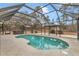 Relaxing screened pool and hot tub area at 18300 Sw 69 Loop, Dunnellon, FL 34432