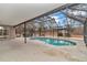 Spacious pool area with screened enclosure at 18300 Sw 69 Loop, Dunnellon, FL 34432