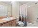 Clean bathroom with shower/tub combo, toilet and vanity at 1982 Somerset Ave, The Villages, FL 32162