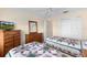 Guest bedroom with twin beds and ample closet space at 1982 Somerset Ave, The Villages, FL 32162