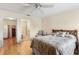 Bright bedroom with ensuite bathroom and walk-in closet at 1982 Somerset Ave, The Villages, FL 32162