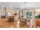 Well-equipped kitchen with light cabinets and an island at 1982 Somerset Ave, The Villages, FL 32162