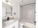 Bathroom featuring granite vanity, shower-tub combination, and modern fixtures at 200 Oak Lane Run, Ocala, FL 34472