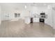 Modern kitchen with stainless steel appliances and white cabinets at 200 Oak Lane Run, Ocala, FL 34472