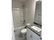 Bathroom featuring a white vanity, granite countertops, and a shower-tub combo at 2158 Nw 23Rd Loop, Ocala, FL 34475