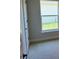 Bedroom featuring carpet, neutral paint, and a window at 2158 Nw 23Rd Loop, Ocala, FL 34475