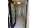 A bright entryway with a decorative glass front door and tile flooring at 2158 Nw 23Rd Loop, Ocala, FL 34475