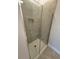 Modern shower with glass enclosure featuring a built-in niche, and tiled walls at 2162 Nw 23Rd Loop, Ocala, FL 34475