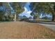 House with a long driveway and mature trees on a large lot at 2645 Se 162Nd Place Rd, Summerfield, FL 34491