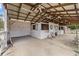 Barn interior with multiple stalls and ceiling fans at 2883 Sw 66Th St, Ocala, FL 34476